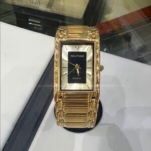 Woman’s Waltham Gold-Tone Rectangular Quartz Watch